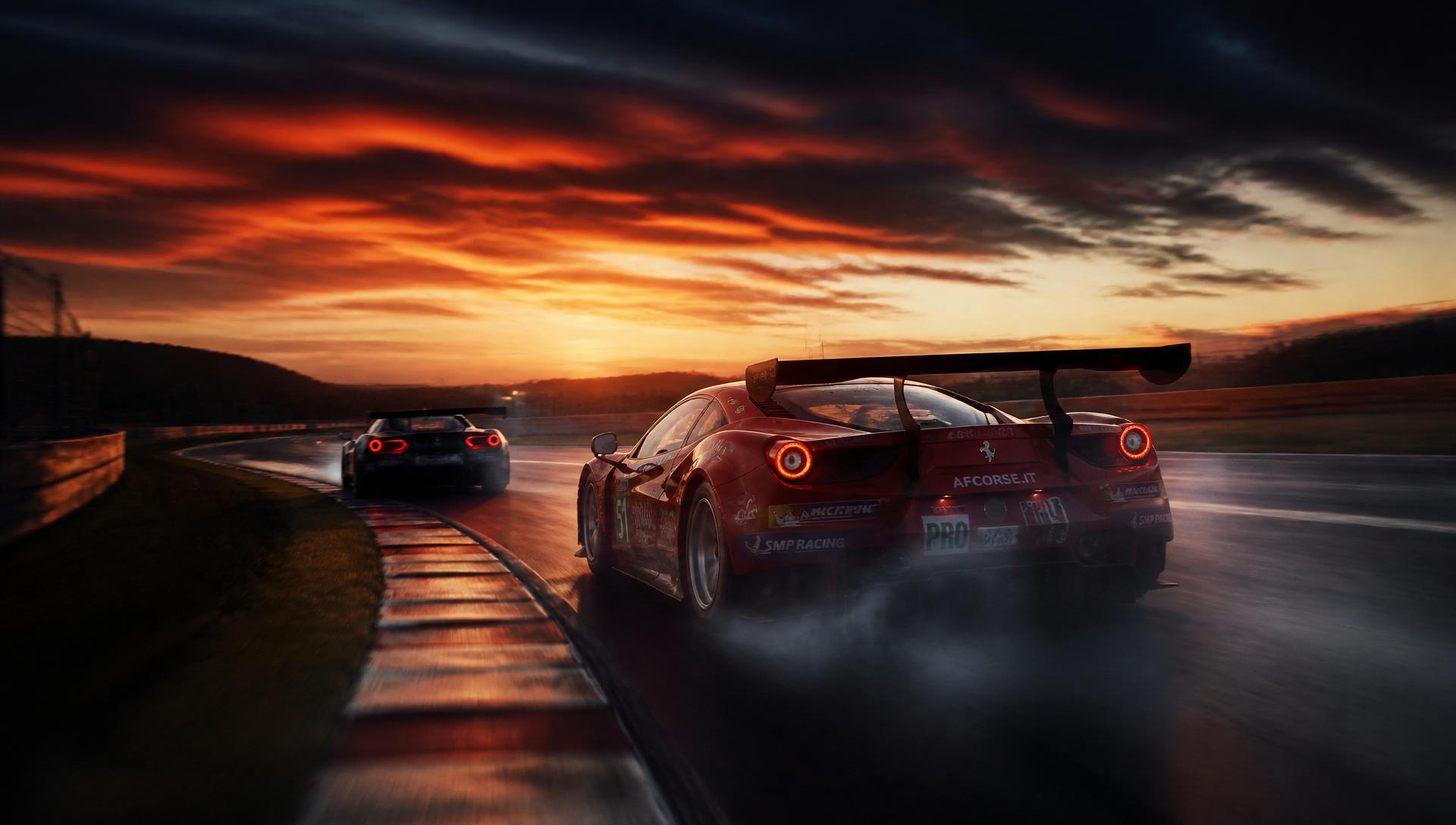GT race cars on track at sunset